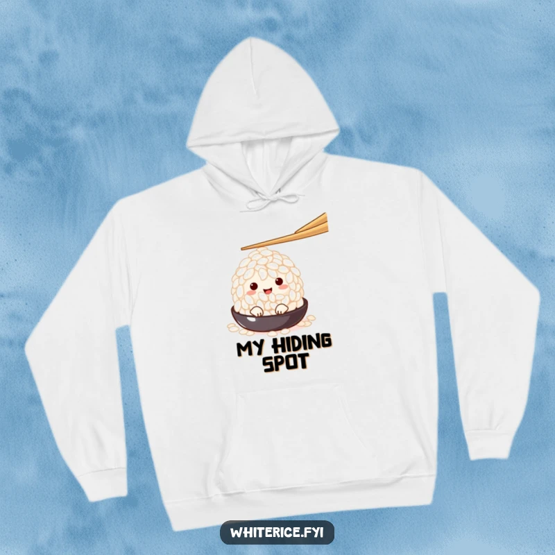 Funny charming white rice grain character peeking from under a chopstick, featured on a cozy hoodie, radiating shy charm and cozy comfort.