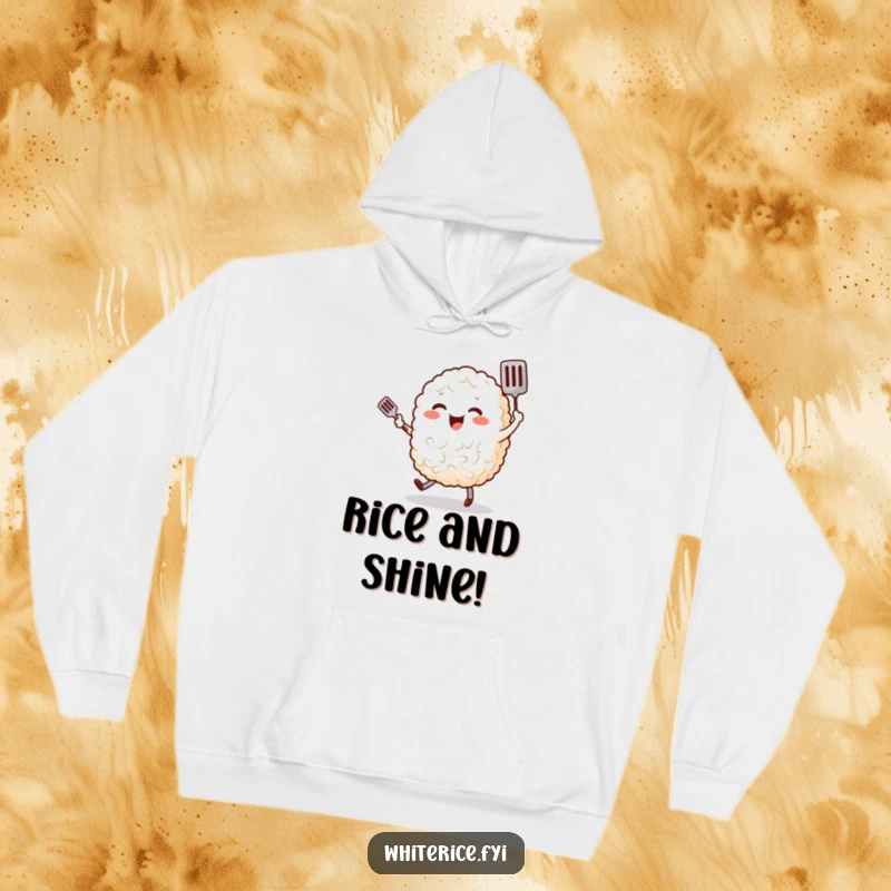 Funny hoodie showing a cheerful, plump grain of rice character happily dancing with a tiny spatula, cozy and food-themed.
